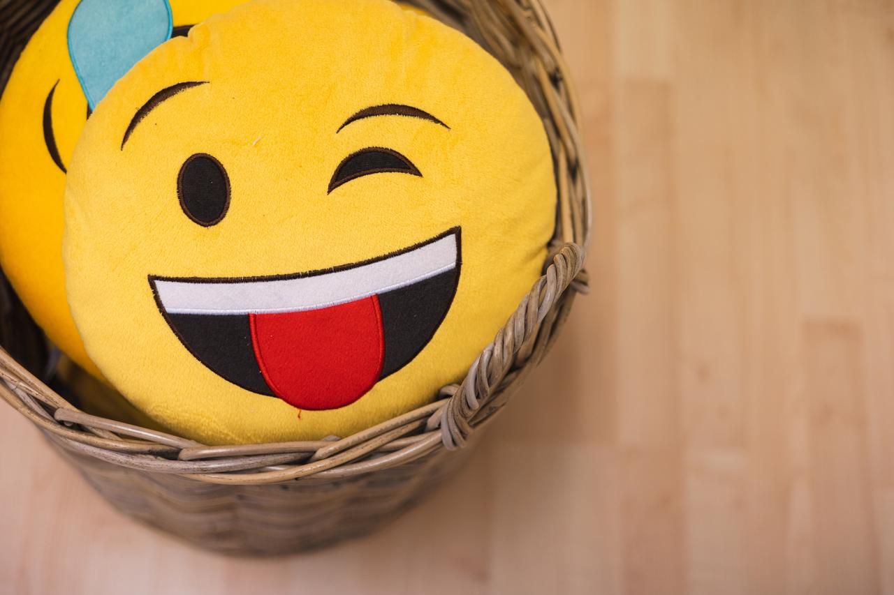Pute med smile-emoji